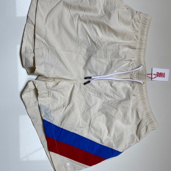 Solid & stripped bathing suit - Picture 1 of 5